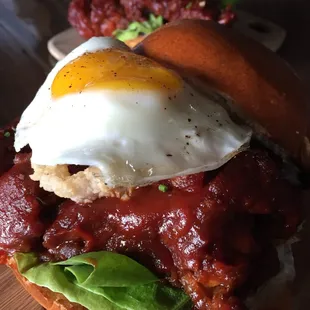 Lunch menu fried chicken sandwich with an added egg