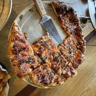 a pizza with a slice taken out of it