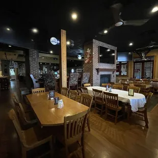 an empty restaurant with tables and chairs