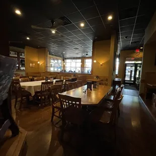 a restaurant with tables and chairs