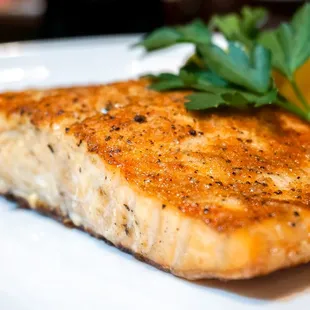 a piece of fish on a plate