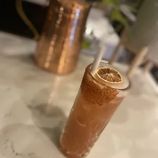 a drink in a tall glass