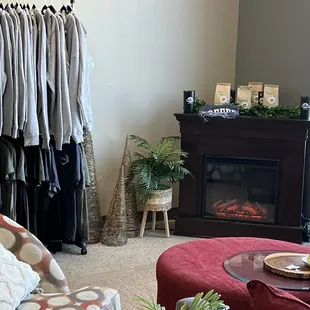  living room with clothes hanging on a rack