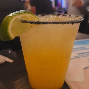 Smokey pineapple margarita. | Ilegal mezcal, triple sec, pineapple juice, and black lava salt on the rim.