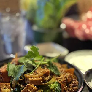 a bowl of stir fried vegetables