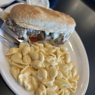 Philly cheesesteak and Mac and cheese