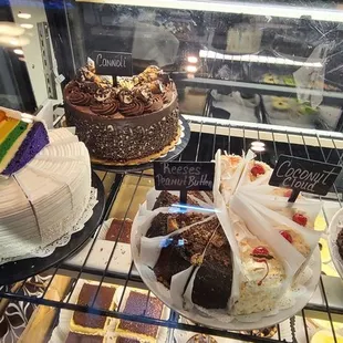 a variety of cakes on display