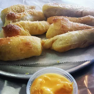 Garlic butter brushed breadsticks rolled in parmesan cheese served piping hot with either marinara or cheese dipping sauce.