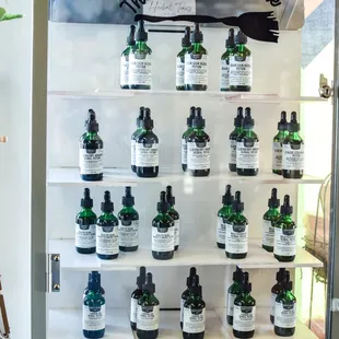 a shelf full of bottles