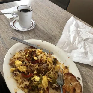 Brothers breakfast; Comes with eggs, hashbrowns , pulled pork, jalapeño, mushrooms,green peppers and Chorizo. I ordered-wheat toast