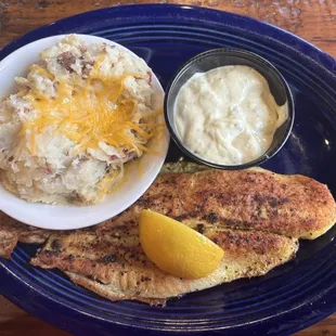 Mashed potatoes, tartar sauce, and grilled catfish with lemon pepper seasoning