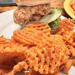 Buffalo chicken sandwich with sweet potato fries