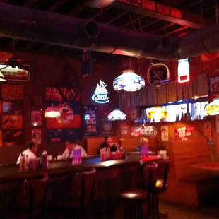 The inside...casual, open seating, sports and beer decor...high top chairs have backs on them so they are comfy!