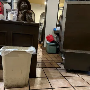 a trash can on the floor