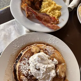 Banana walnut pancake with eggs, bacon and seasoned potatoes