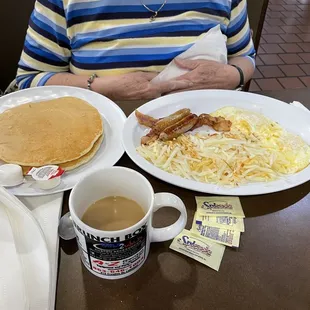 "Grandpa's Breakfast" 2 each eggs, bacon, sausage, pancakes &amp; hash browns