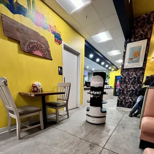 a woman sitting at a table