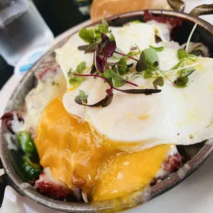 Corned beef hash skillet. LOTS o&apos; cheese, yum!