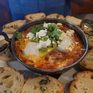 Shakshuka, berry waffle,corn beef hash