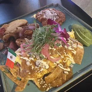 Chipotle chilaquiles omelette with potatoes
