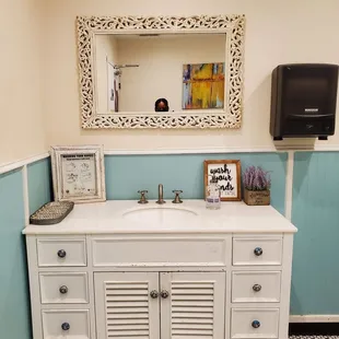  bathroom with a sink and mirror