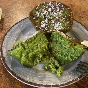 a piece of cake on a plate with a fork