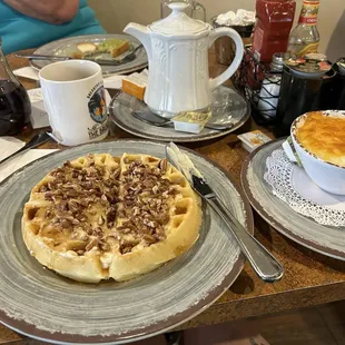Avocado Toast plate with eggs over medium cup of hot tea