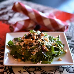 Mean Greens Salad -  Organic Spinach and Kale, Candied Crans and Almonds, Honey Raz Vinaigrette