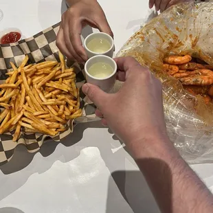 Sharing shots of Sho Chiku Bai over 2# of shrimp &amp; seasoned fries.