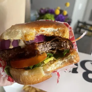 First bite! Omg good!   The chicken fried steak sandwich- Nashville style