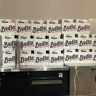 a stack of budlo radio radio boxes