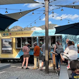 This is a well-run food truck with lots of shaded tables and lots of menu offerings.
