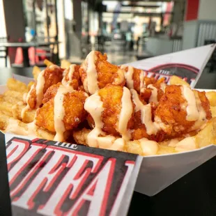 a plate of food with fries