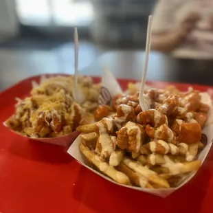 a plate of fries and a bowl of fries