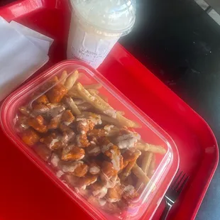 Buffalo fries with chipotle sauce &amp; strawberry shake