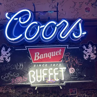 Neon Coors and Buffet sign