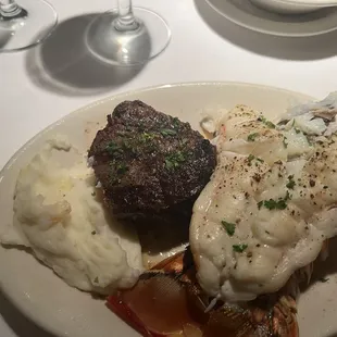Petite Filet, Lobster Tail, sauté mushrooms and mashed potatoes.