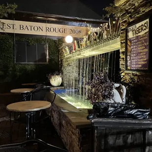 a fountain in the middle of a patio