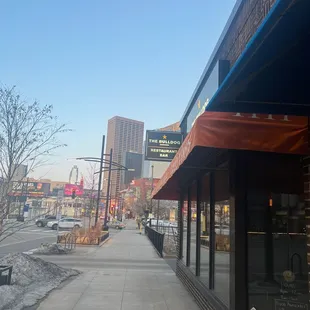 a view of a sidewalk and a sidewalk