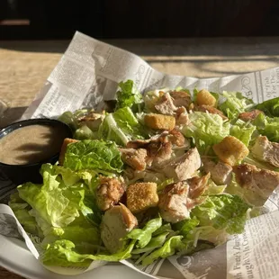 $20 salads. Chicken Caesar salad. Is it worth it? No.