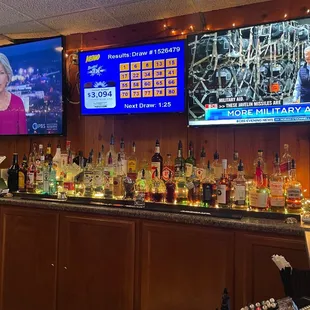 a bar with a large television