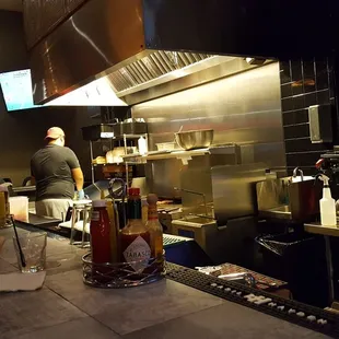 a man sitting at the bar