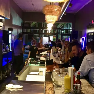 people sitting at the bar