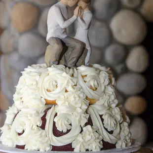2 tier wedding cake. Raspberry Truffle on top, Red Velvet on bottom