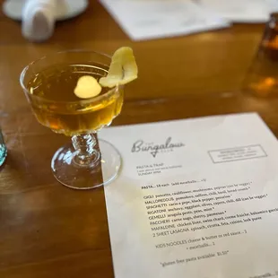 a drink and a menu
