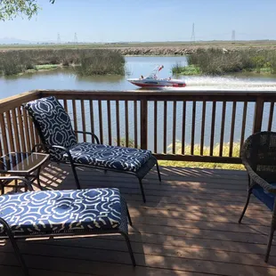 Enjoy watching boats go by off the comfort of your private deck.