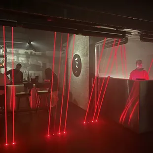 a bar with red lights