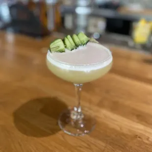 a cocktail in a coupe glass