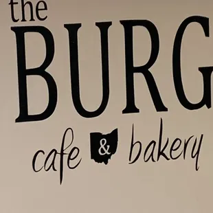 a sign for the burg cafe and bakery