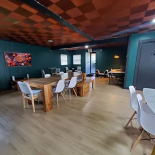 a wooden table and chairs